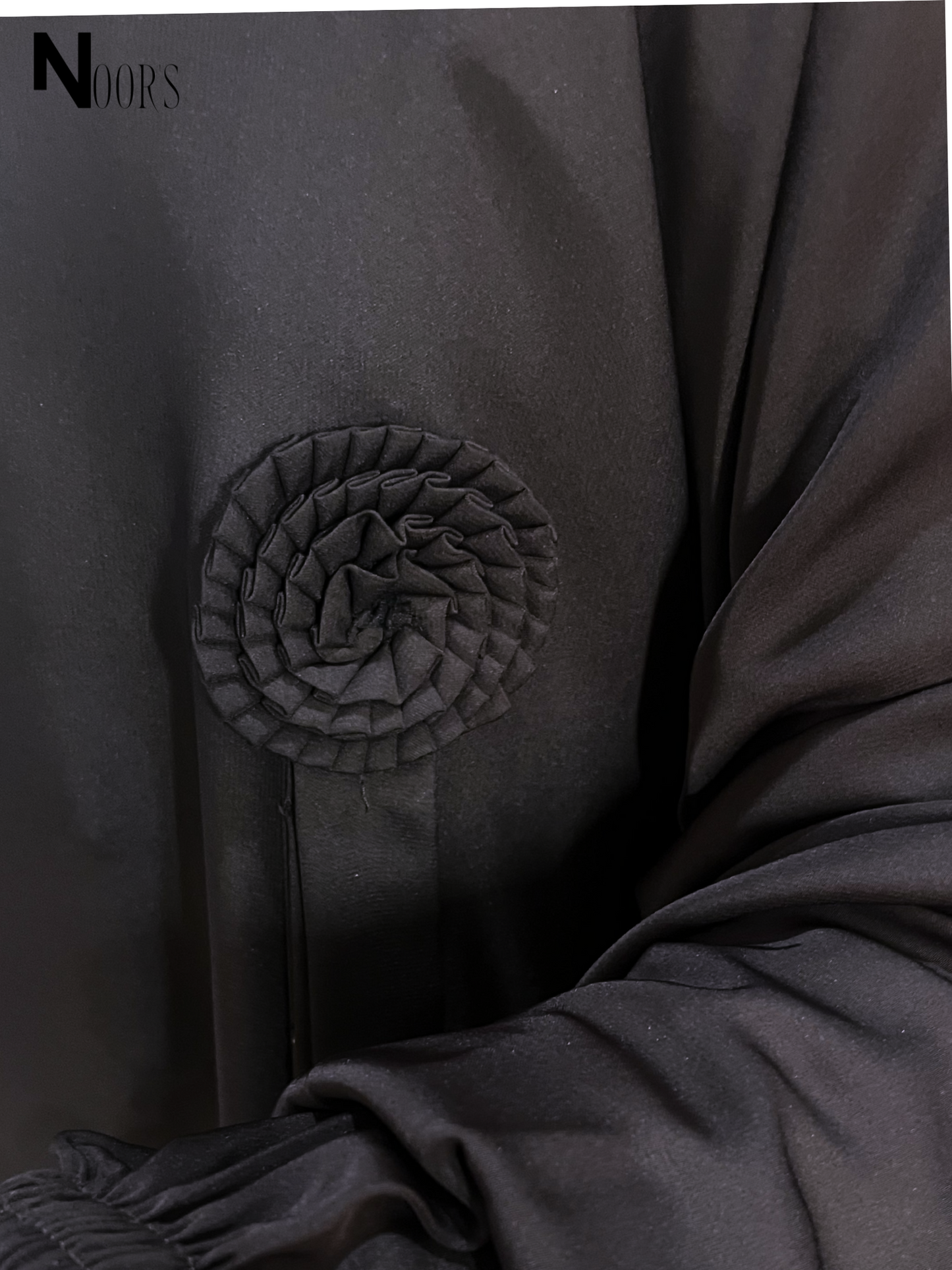 Noor's Classic Black Abaya with Pleated Rosette Detail