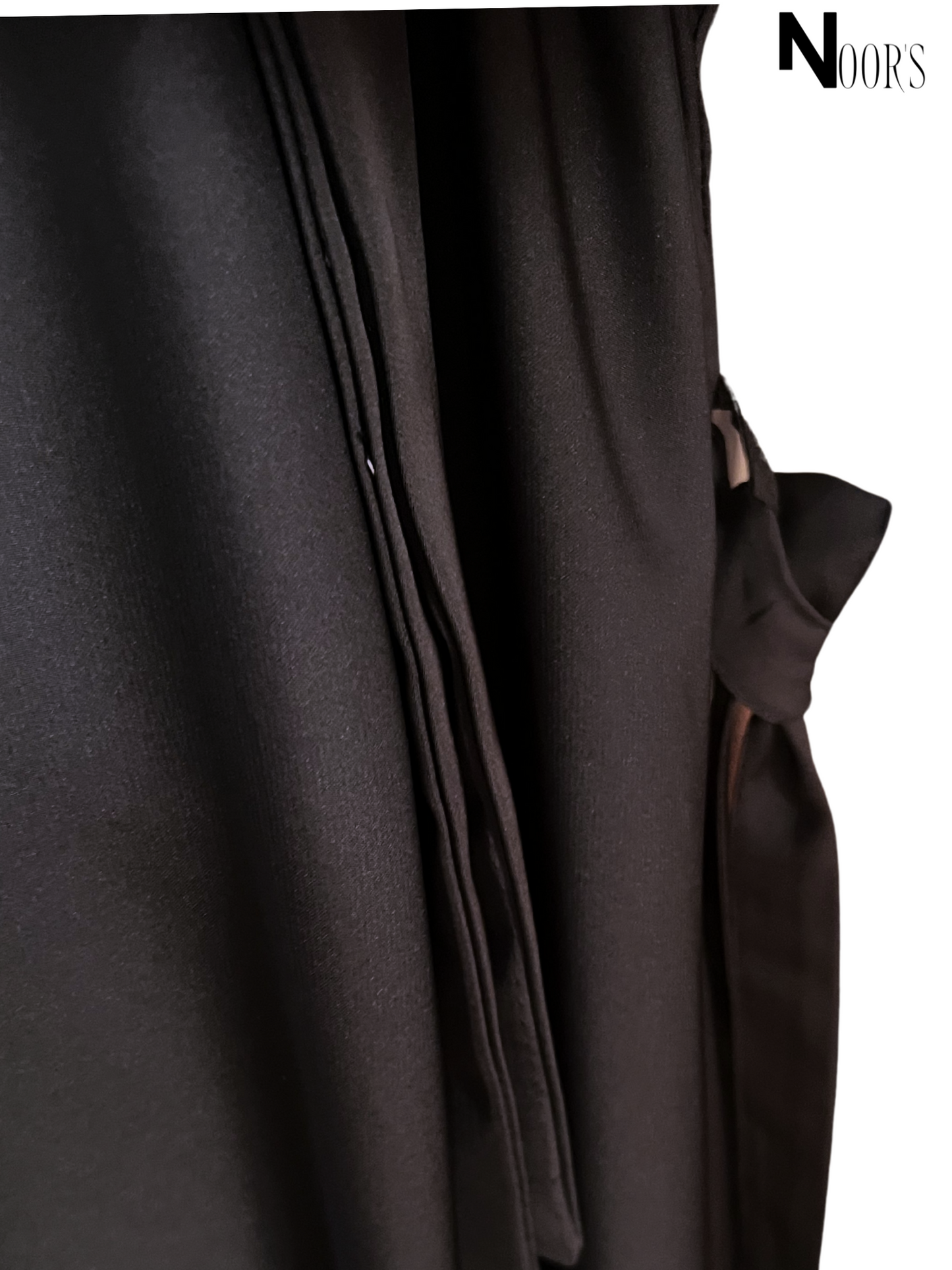 Noor's Classic Black Abaya with Pleated Rosette Detail